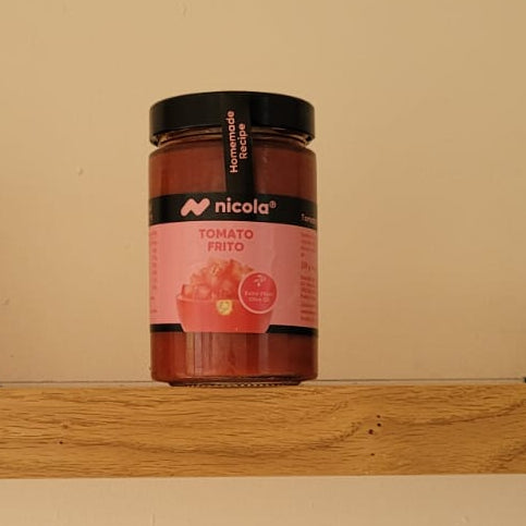 Authenitic Spanish tomato frito with pink label on glass jar